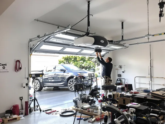 Storrs Garage Door Repair specialist installing smart garage door opener system in Storrs home