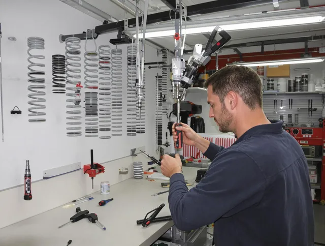 Storrs Garage Door Repair safety certified technician performing precision spring replacement in Storrs