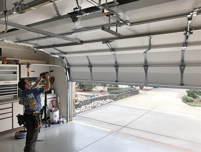 Garage door track repair service by Storrs Garage Door Repair in Storrs